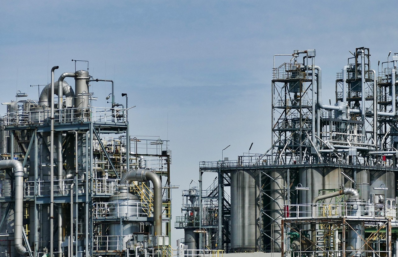 Upgrading Pyrolysis Oils to Fuels and Chemicals